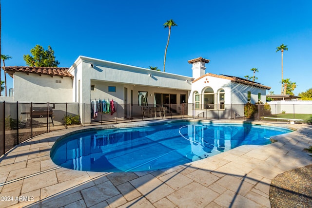 view of pool with a patio