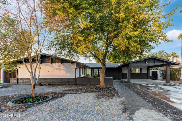 view of front of house with a carport