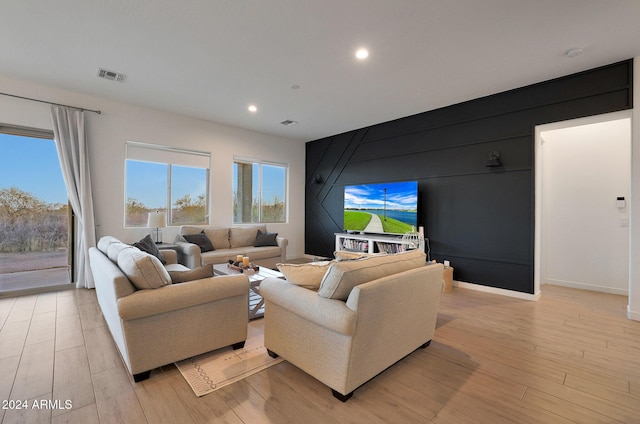 living room with light hardwood / wood-style floors