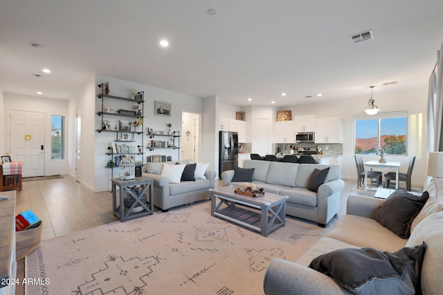 living room featuring light hardwood / wood-style flooring