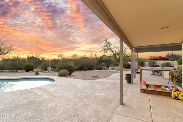 pool featuring outdoor dining area and a patio