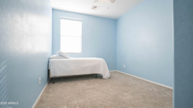 18269 W Vogel Ave, Waddell, AZ 85355 - bedroom with carpet flooring, baseboards, and a ceiling fan