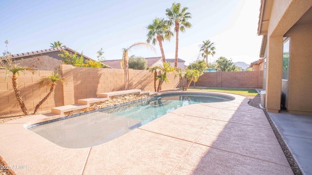 18269 W Vogel Ave, Waddell, AZ 85355 - view of swimming pool with a patio and a fenced backyard