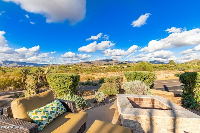 view of patio / terrace with a mountain view