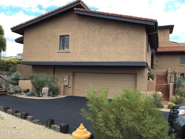 view of front of house with a garage