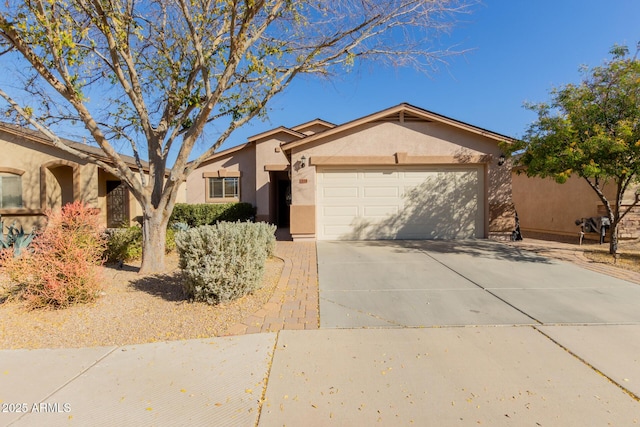 ranch-style home with a garage