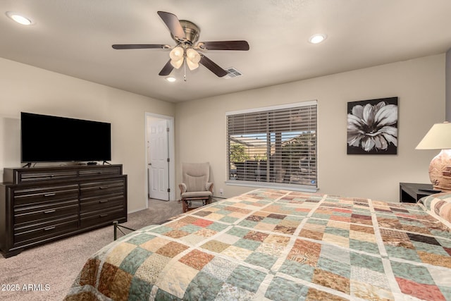 carpeted bedroom featuring ceiling fan