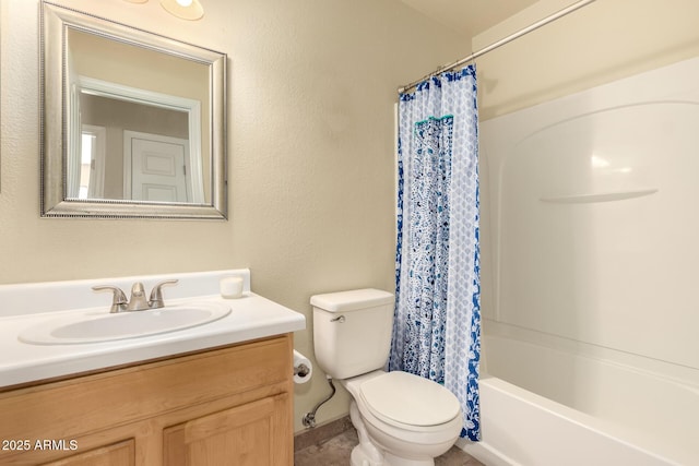 full bathroom with shower / bath combo, toilet, and vanity