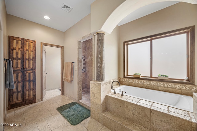 bathroom with independent shower and bath