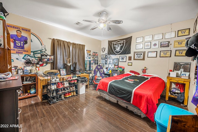 bedroom featuring wood-type flooring and ceiling fan