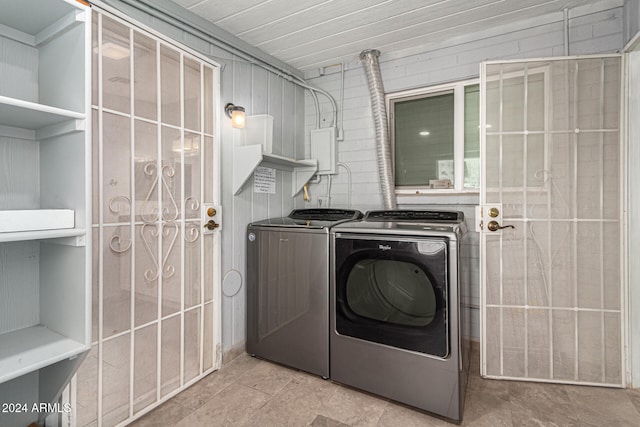 laundry room with washer and dryer