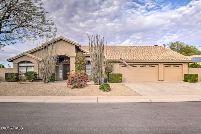 view of front of home with a garage