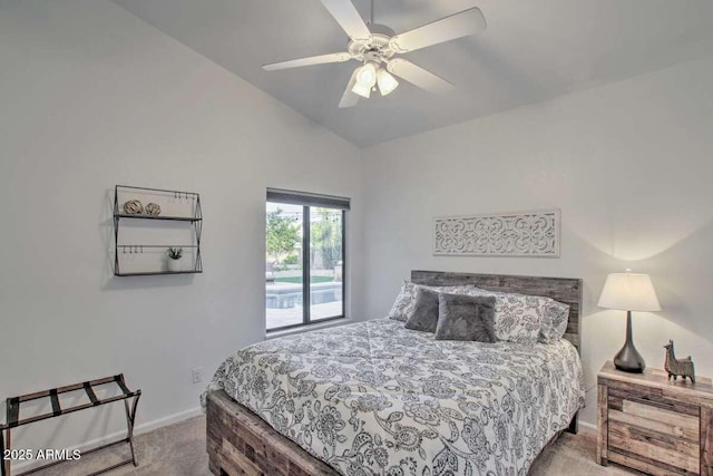 bedroom featuring vaulted ceiling, ceiling fan, and light colored carpet