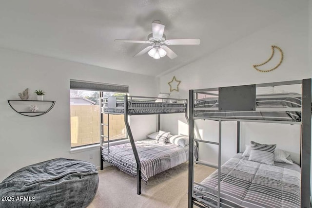 bedroom featuring lofted ceiling, carpet flooring, and ceiling fan