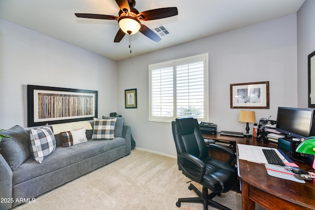 office area with light carpet and ceiling fan