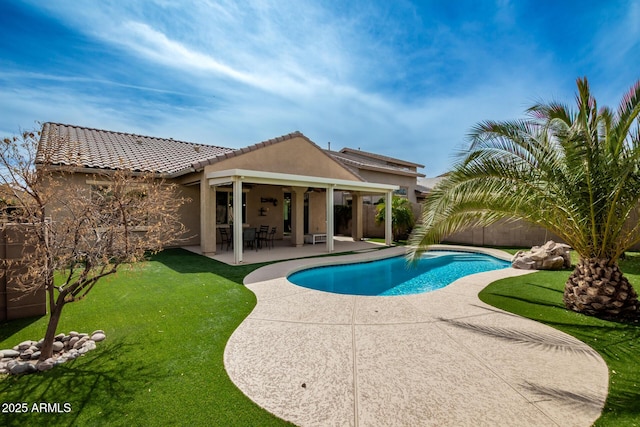 view of pool featuring a patio area, a fenced backyard, a fenced in pool, and a yard