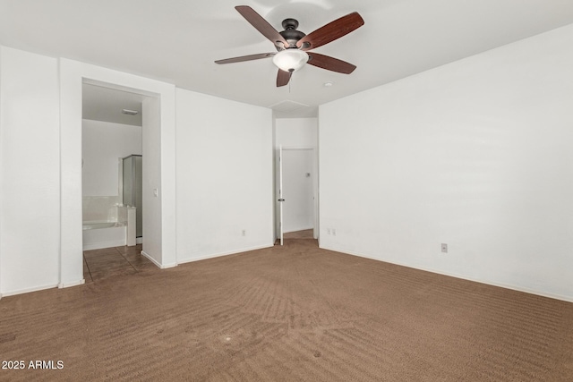 unfurnished bedroom featuring carpet and ensuite bathroom