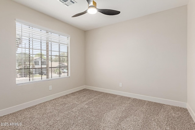 33287 N Windmill Run, San Tan Valley, AZ 85144 - spare room featuring ceiling fan, carpet floors, and baseboards