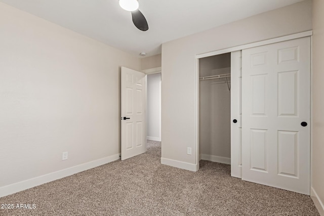 33287 N Windmill Run, San Tan Valley, AZ 85144 - unfurnished bedroom featuring carpet flooring, a closet, baseboards, and a ceiling fan