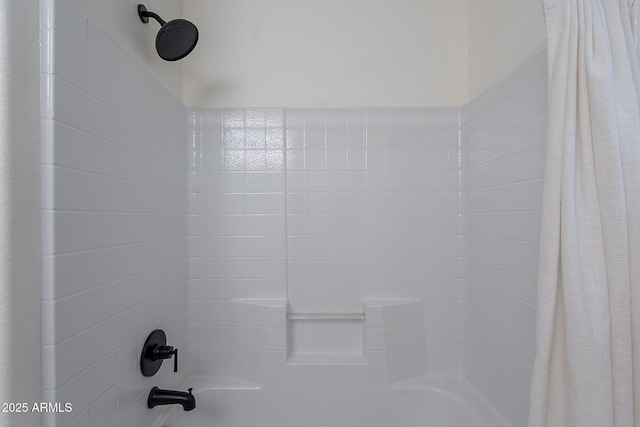 room details with shower / bath combo with shower curtain