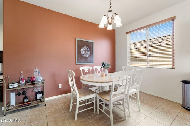 7790 E Bravo Ln, Prescott Valley, AZ 86314 - dining space featuring light tile patterned floors and a chandelier
