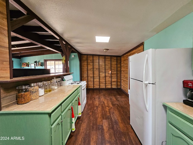 kitchen with dark hardwood / wood-style flooring, a textured ceiling, white appliances, wooden walls, and green cabinetry