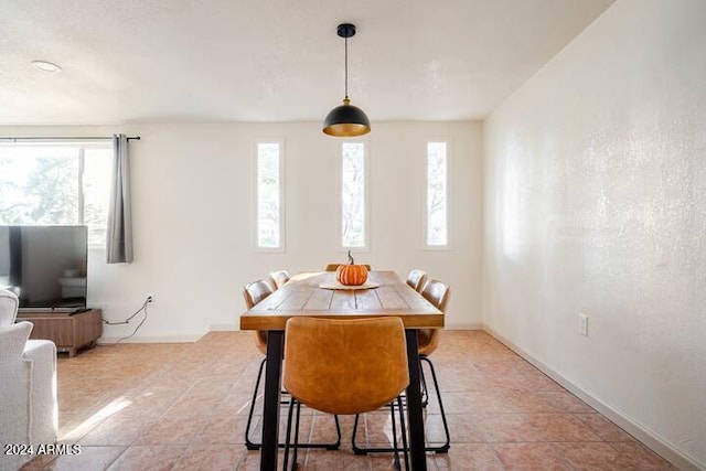 view of tiled dining space