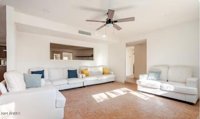 living room featuring ceiling fan