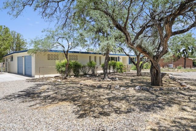 ranch-style home with a garage