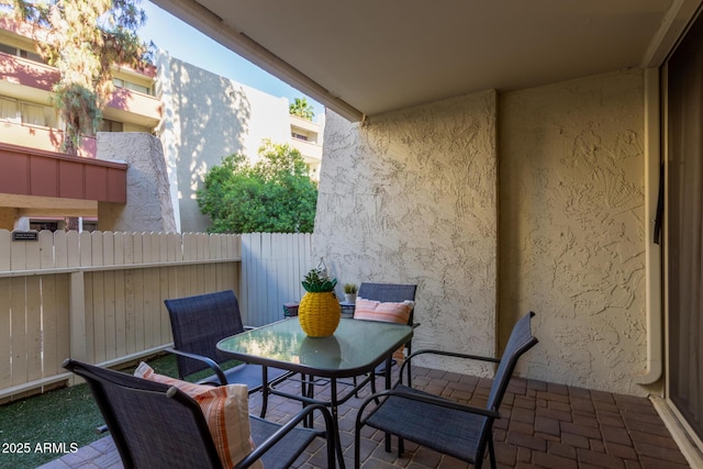 view of patio / terrace with fence