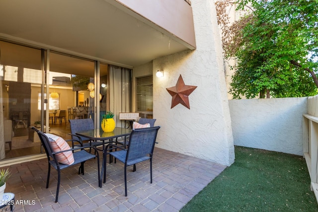 view of patio / terrace with fence and outdoor dining space