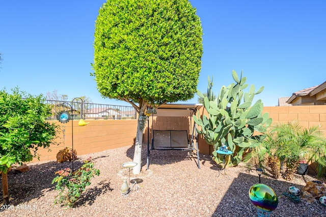 view of yard featuring a fenced backyard