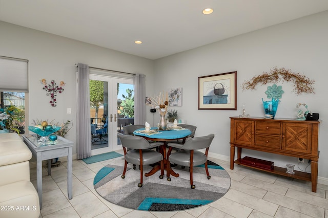 dining room with light tile patterned floors, french doors, baseboards, and recessed lighting