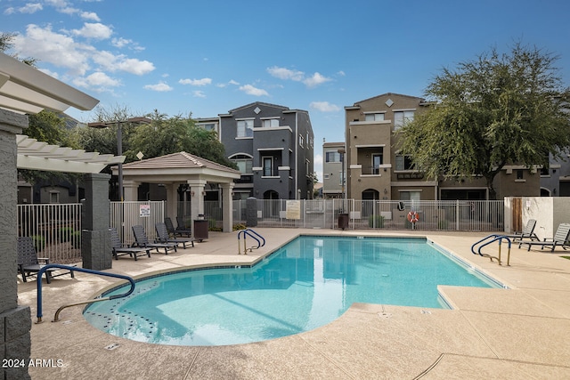 view of pool featuring a pergola and a patio area