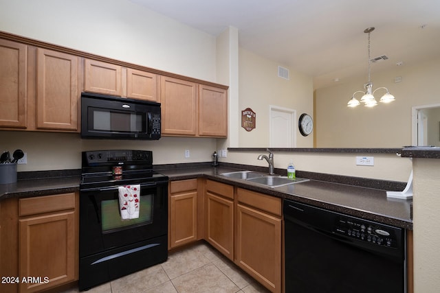 kitchen featuring sink, a chandelier, decorative light fixtures, light tile patterned floors, and black appliances