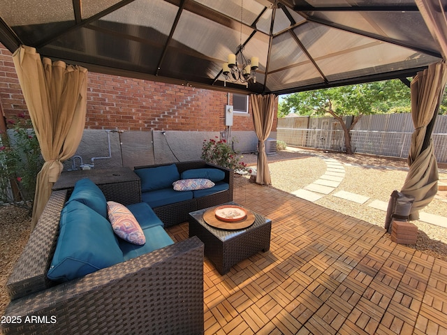 405 Powell St, Bisbee, AZ 85603 - view of patio / terrace featuring a gazebo, an outdoor hangout area, and fence