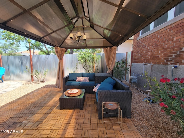 405 Powell St, Bisbee, AZ 85603 - view of patio with a gazebo, outdoor lounge area, and a fenced backyard