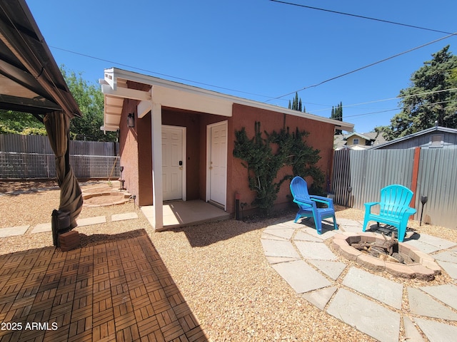 405 Powell St, Bisbee, AZ 85603 - view of patio / terrace with fence and a fire pit