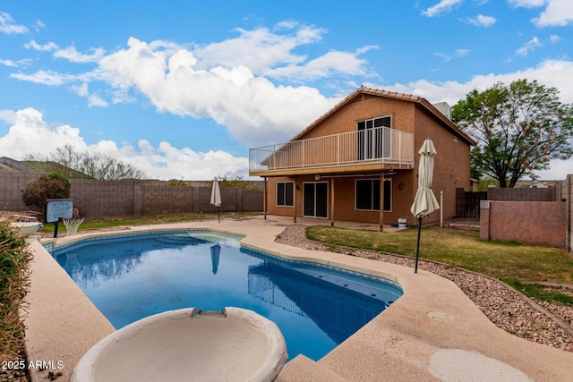 view of pool with a fenced in pool, a yard, a fenced backyard, and a patio area