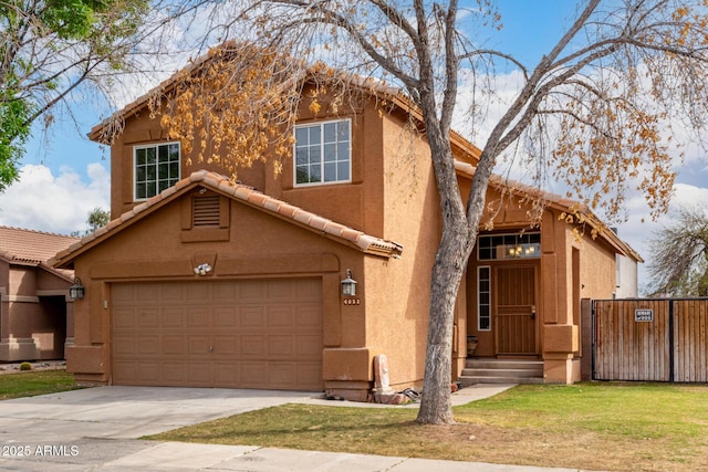 view of front of property with fence, stucco siding, concrete driveway, a front lawn, and a tiled roof