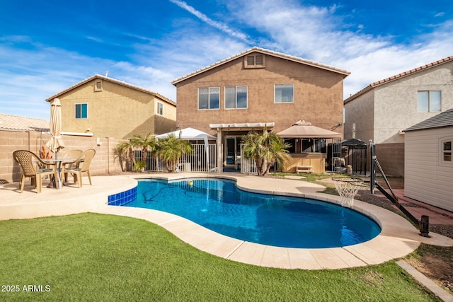 view of swimming pool with a gazebo and a patio area