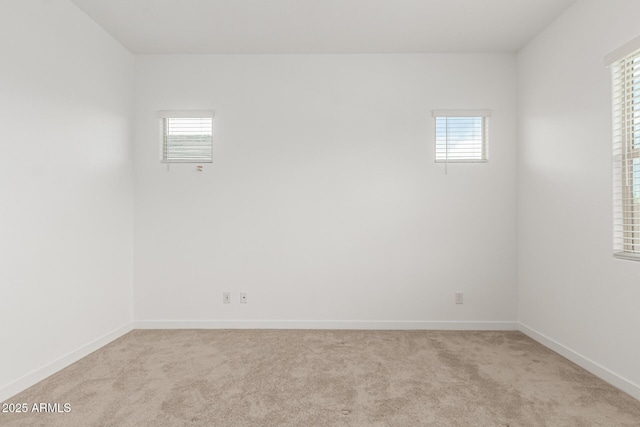 19151 W Coolidge St, Litchfield Park, AZ 85340 - spare room with light colored carpet and baseboards
