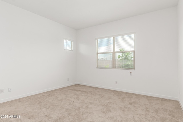 19151 W Coolidge St, Litchfield Park, AZ 85340 - empty room with light colored carpet and baseboards