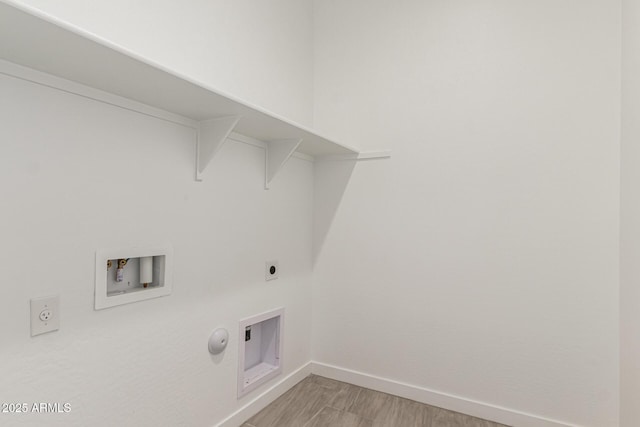 19151 W Coolidge St, Litchfield Park, AZ 85340 - laundry room featuring hookup for an electric dryer, washer hookup, baseboards, and hookup for a gas dryer