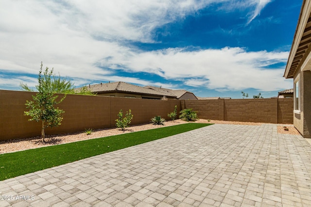 19151 W Coolidge St, Litchfield Park, AZ 85340 - fenced backyard featuring a patio