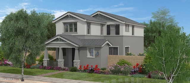 view of front of home with a front yard and a porch