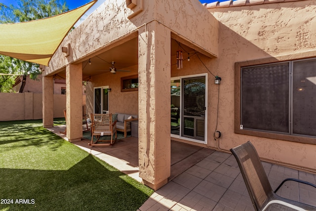 view of patio with ceiling fan