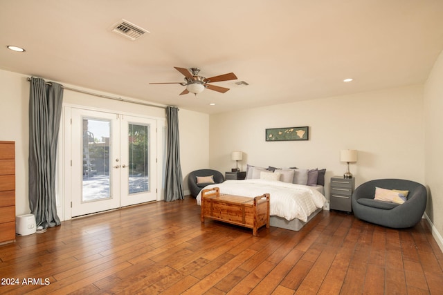 bedroom featuring dark wood-type flooring, ceiling fan, french doors, and access to exterior