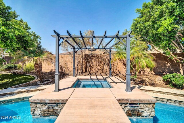 view of swimming pool with a pergola, a patio area, and pool water feature