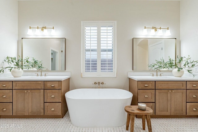 bathroom with vanity and a bathtub